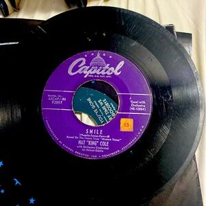 It’s Crazy Nat King Cole and smile 45 record